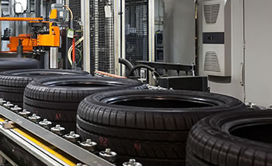 Tyres on a conveyor belt
